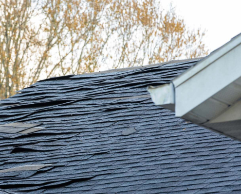 Hidden Storm Damage Signs Cambridge Homeowners Should Document Before Insurance Deadlines Expire 1 An illustration highlighting key indicators that a roof needs replacement, including visible damage and age.