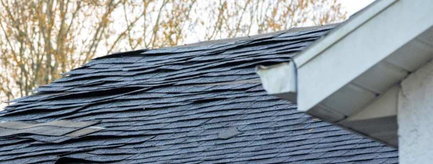 Hidden Storm Damage Signs Cambridge Homeowners Should Document Before Insurance Deadlines Expire 1 An illustration highlighting key indicators that a roof needs replacement, including visible damage and age.
