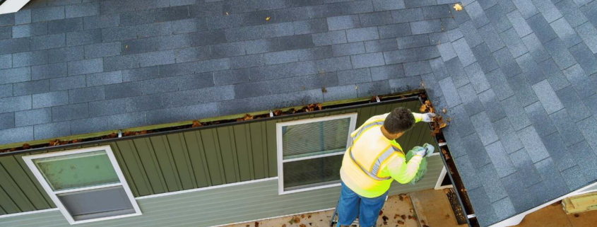 An illustration of a professional roofing contractor performing maintenance on a roof.