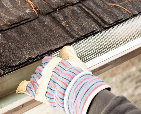 Gutter guards being fitted on install day