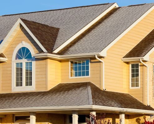 Alexandria Roof Insurance Claims: What Happens After Wind or Storm Damage 2 yellow-home-siding-installation