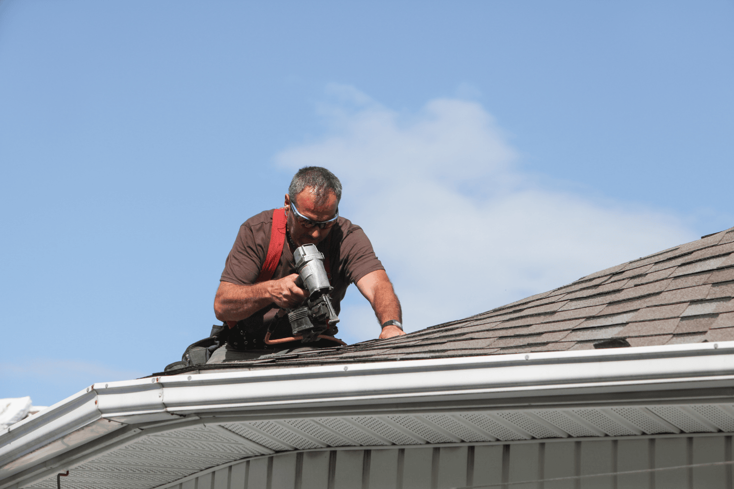 How to Quickly Fix Leak on Roof: A Practical Guide 6 A professional roofer conducting a regular roof inspection.