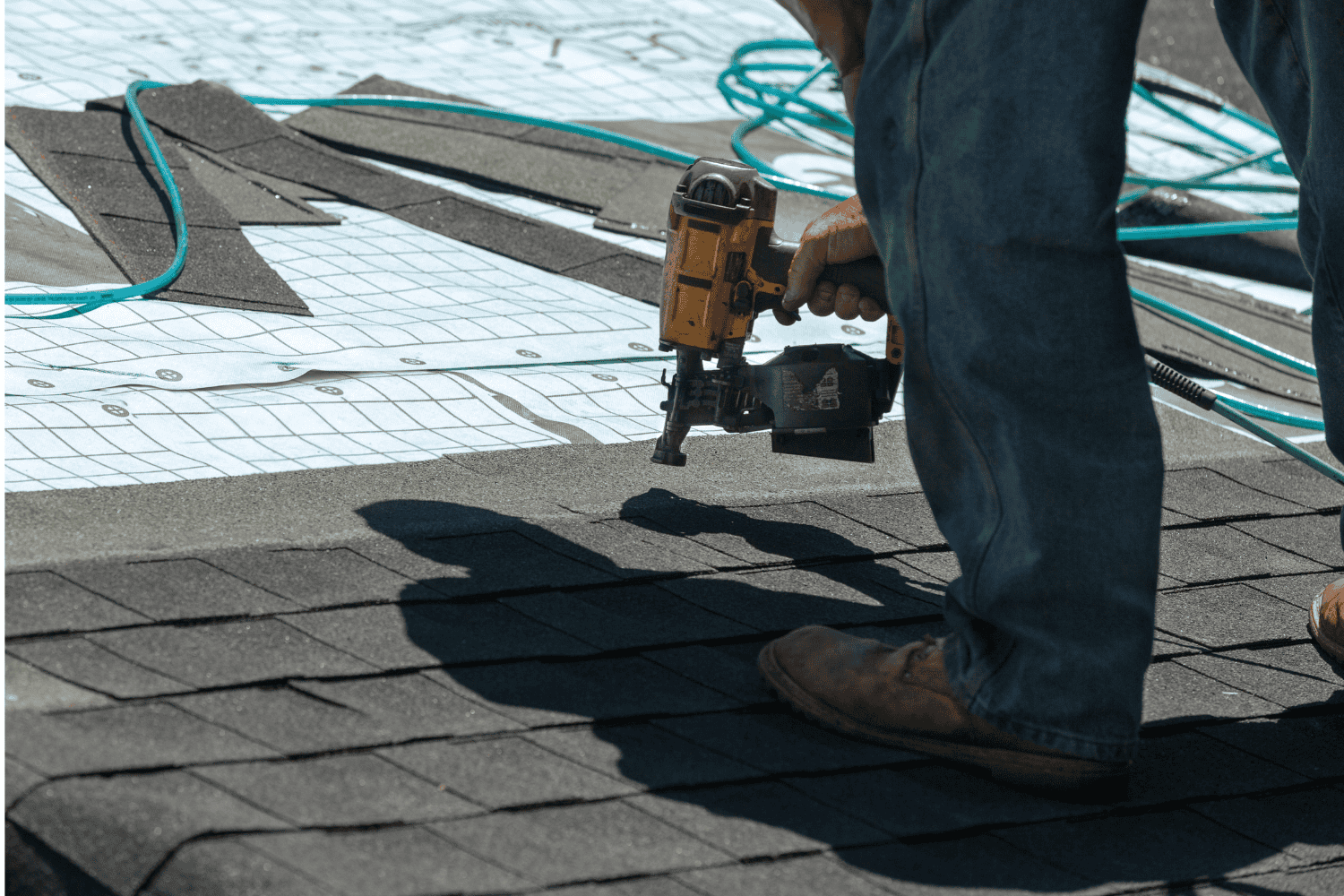 Different types of asphalt roofing shingles including architectural and luxury options.