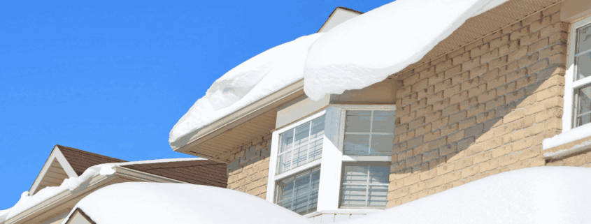 Harrisburg, PA Homeowners: Don’t Miss These Important Winter Roofing Red Flags That Protect Your Home 1 A winter roof showcasing a new installation with snow on top.