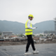 Choosing the right roofing company with an image of a roofing contractor at work.