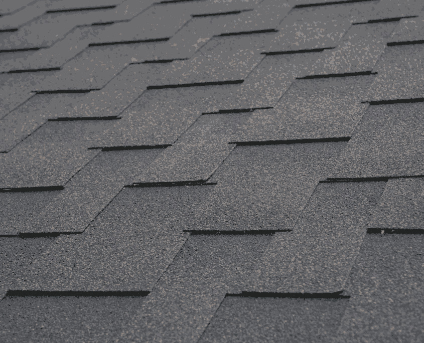 A beautiful house with architectural shingles enhancing its curb appeal. A shore home with an architectural shingle roof