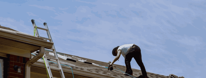 How to Spot & Avoid Common Roofing Scams in Maryland’s Mid-Atlantic Region 1 A maintenance check being performed on an architectural shingle roof.