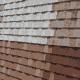 A variety of asphalt shingles displayed in different colors and styles showcasing the popular choice for roofing 1