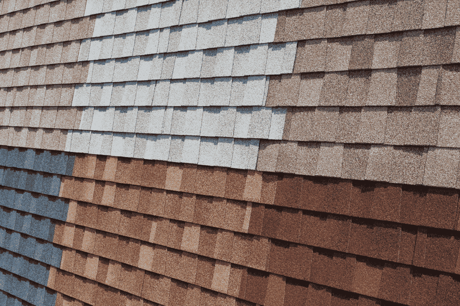 A variety of asphalt shingles displayed in different colors and styles, showcasing the popular choice for roofing.