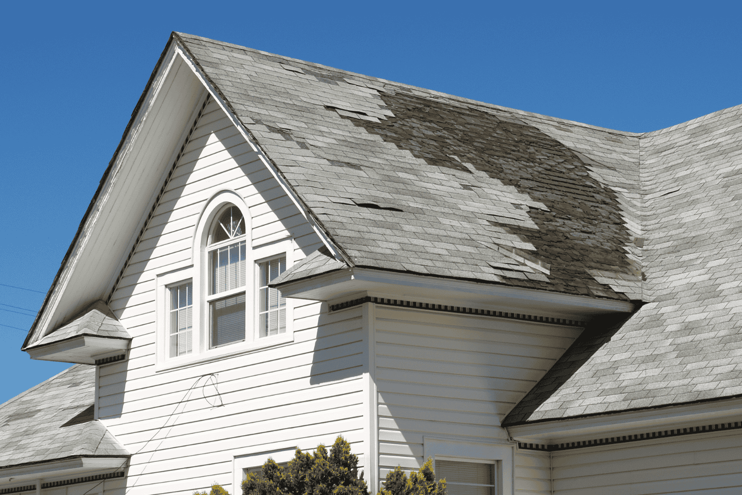 How Long Does a Roof Last? Average Lifespan by Material 4 Signs of roof damage including curling shingles and leaks.