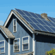 Solar shingles integrated into a roof, demonstrating energy efficiency.